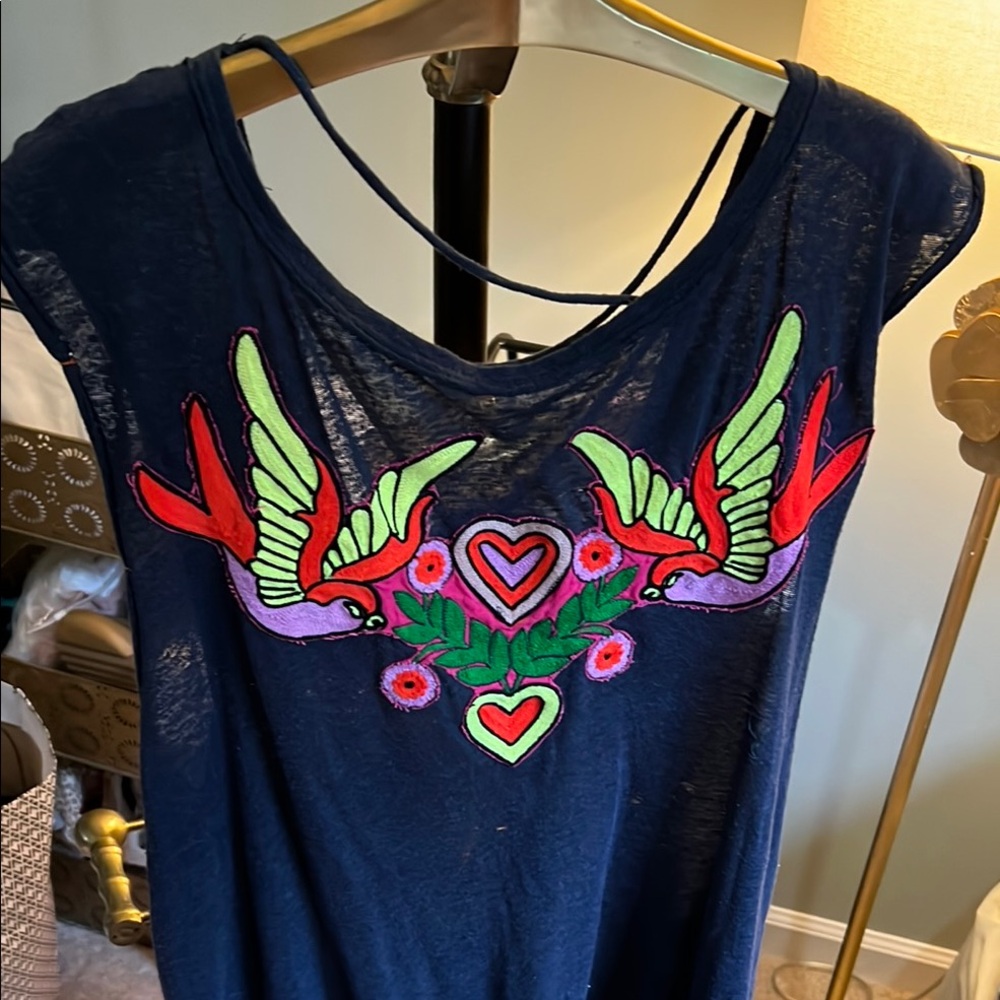 Free People tie back wide armpit muscle tank, size L, vibrant graphic on front.